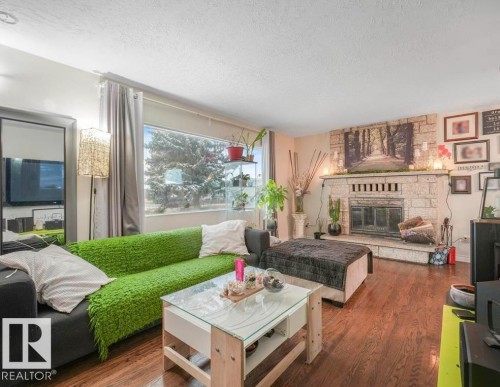 9524 129A Avenue, Edmonton, AB - Indoor Photo Showing Living Room With Fireplace
