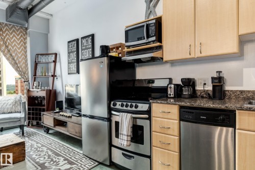 510 10024 Jasper Avenue, Edmonton, AB - Indoor Photo Showing Kitchen With Stainless Steel Kitchen