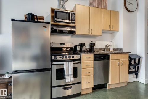 510 10024 Jasper Avenue, Edmonton, AB - Indoor Photo Showing Kitchen With Stainless Steel Kitchen