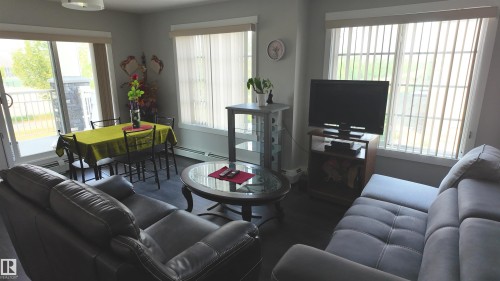 206 3670 139 Avenue, Edmonton, AB - Indoor Photo Showing Living Room