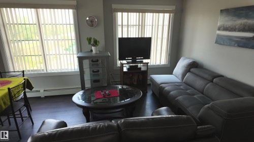 206 3670 139 Avenue, Edmonton, AB - Indoor Photo Showing Living Room