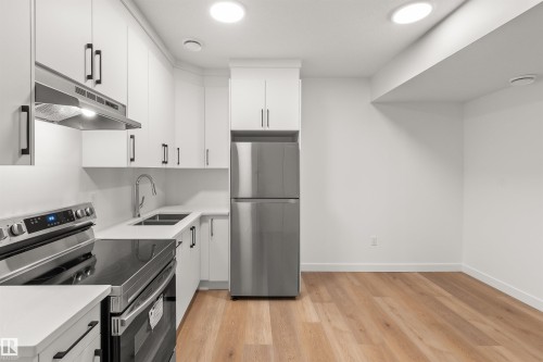4207 38 Street, Beaumont, AB - Indoor Photo Showing Kitchen With Double Sink