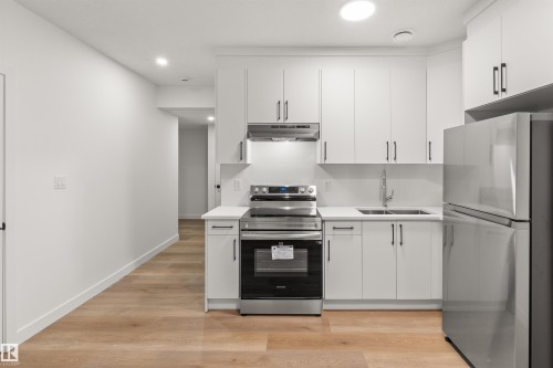 4207 38 Street, Beaumont, AB - Indoor Photo Showing Kitchen With Double Sink With Upgraded Kitchen