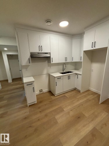 4207 38 Street, Beaumont, AB - Indoor Photo Showing Kitchen With Double Sink