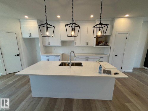 4207 38 Street, Beaumont, AB - Indoor Photo Showing Kitchen With Double Sink
