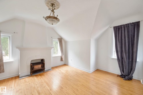 10149 122 Street, Edmonton, AB - Indoor Photo Showing Living Room With Fireplace