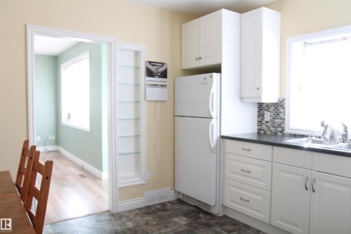 5114 52 Avenue, Elk Point, AB - Indoor Photo Showing Kitchen With Double Sink