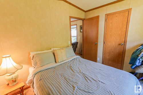 529 12002 Twp Rd 605, Rural St. Paul County, AB - Indoor Photo Showing Bedroom