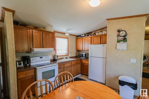 529 12002 Twp Rd 605, Rural St. Paul County, AB - Indoor Photo Showing Kitchen With Double Sink