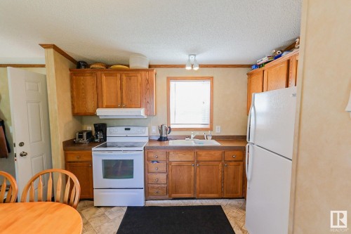 529 12002 Twp Rd 605, Rural St. Paul County, AB - Indoor Photo Showing Kitchen With Double Sink
