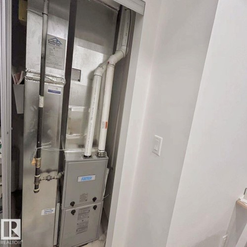 202 860 Secord Boulevard, Edmonton, AB - Indoor Photo Showing Basement