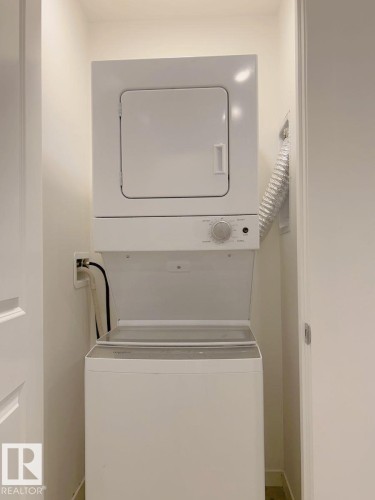 202 860 Secord Boulevard, Edmonton, AB - Indoor Photo Showing Laundry Room