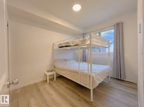 202 860 Secord Boulevard, Edmonton, AB - Indoor Photo Showing Bedroom