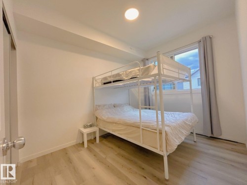 202 860 Secord Boulevard, Edmonton, AB - Indoor Photo Showing Bedroom