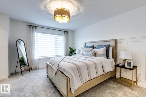 301 Juniper Cove, Leduc, AB - Indoor Photo Showing Bedroom