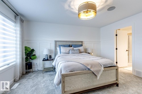 301 Juniper Cove, Leduc, AB - Indoor Photo Showing Bedroom