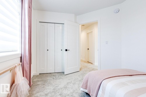 301 Juniper Cove, Leduc, AB - Indoor Photo Showing Bedroom