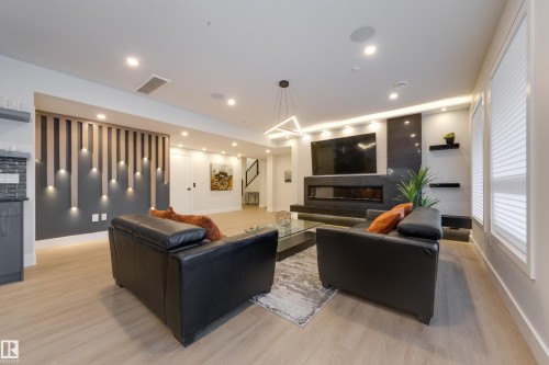 4111 Whispering River Dr. Drive Sw, Edmonton, AB - Indoor With Fireplace