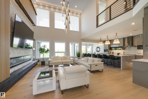 4111 Whispering River Dr. Drive Sw, Edmonton, AB - Indoor Photo Showing Living Room With Fireplace