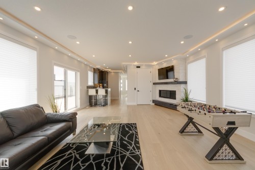 4111 Whispering River Dr. Drive, Edmonton, AB - Indoor Photo Showing Living Room With Fireplace