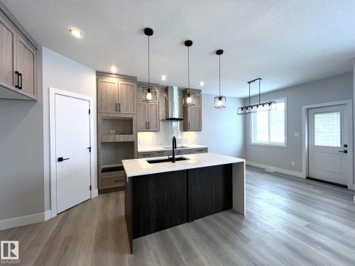 57 Wynn Road, Fort Saskatchewan, AB - Indoor Photo Showing Kitchen With Upgraded Kitchen