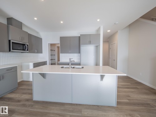 7139 177 Avenue, Edmonton, AB - Indoor Photo Showing Kitchen With Double Sink With Upgraded Kitchen