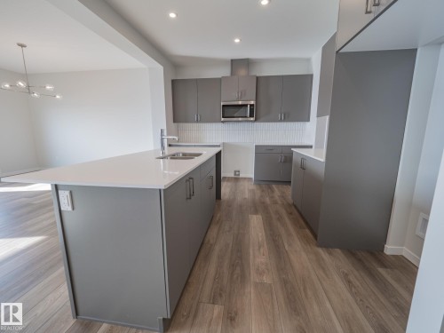 7139 177 Avenue, Edmonton, AB - Indoor Photo Showing Kitchen With Double Sink With Upgraded Kitchen