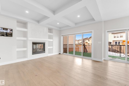 824 34 Avenue, Edmonton, AB - Indoor Photo Showing Living Room With Fireplace