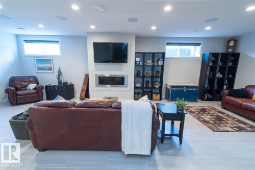 9104 83 Street, Edmonton, AB - Indoor Photo Showing Other Room With Fireplace