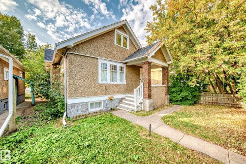 View of front of house featuring stucco siding and covered porch - 12605 107 Avenue, Edmonton, AB - Outdoor