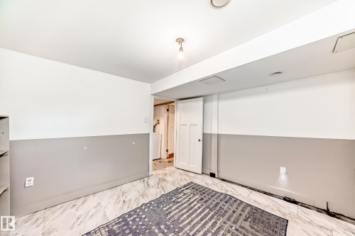View of basement flex room - 12605 107 Avenue, Edmonton, AB - Indoor Photo Showing Other Room