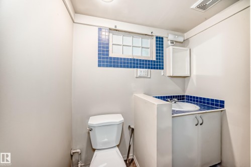 Half bathroom with toilet and vanity - 12605 107 Avenue, Edmonton, AB - Indoor Photo Showing Bathroom