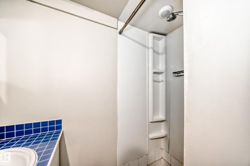 Bathroom featuring a shower and vanity - 12605 107 Avenue, Edmonton, AB - Indoor