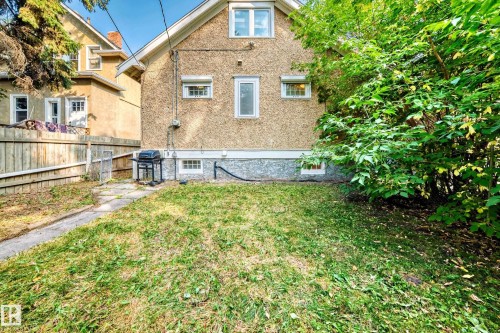 Rear view of property with stucco siding - 12605 107 Avenue, Edmonton, AB - Outdoor