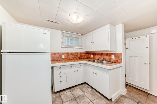 12605 107 Avenue, Edmonton, AB - Indoor Photo Showing Kitchen With Double Sink