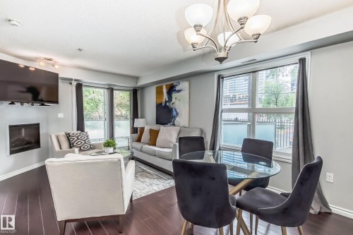 115 10118 106 Avenue, Edmonton, AB - Indoor With Fireplace