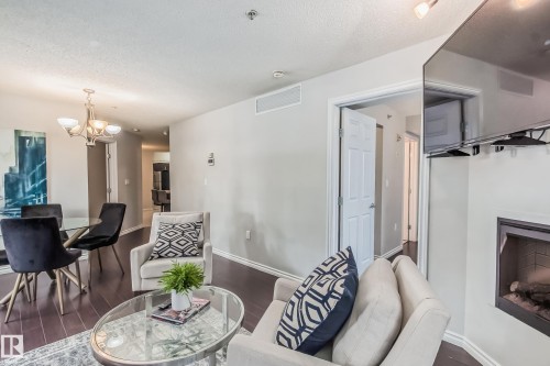 115 10118 106 Avenue, Edmonton, AB - Indoor With Fireplace
