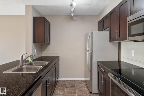 416 5370 Chappelle Road, Edmonton, AB - Indoor Photo Showing Kitchen With Stainless Steel Kitchen With Double Sink