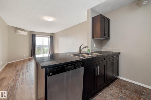 416 5370 Chappelle Road, Edmonton, AB - Indoor Photo Showing Kitchen With Double Sink