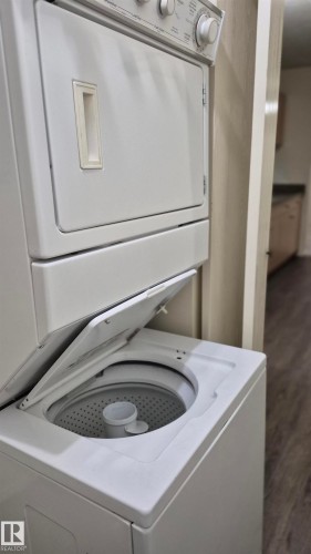 114 2430 Guardian Road, Edmonton, AB - Indoor Photo Showing Laundry Room