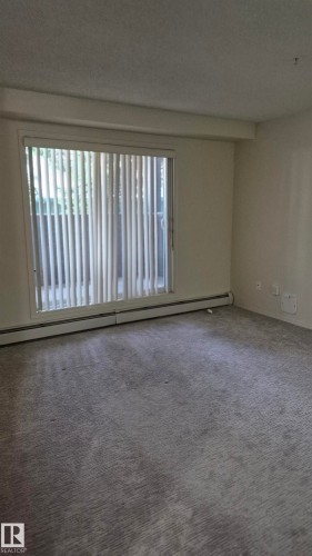 114 2430 Guardian Road, Edmonton, AB - Indoor Photo Showing Other Room