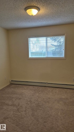 114 2430 Guardian Road, Edmonton, AB - Indoor Photo Showing Other Room