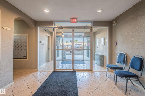 114 2430 Guardian Road, Edmonton, AB - Indoor Photo Showing Other Room