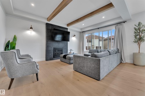 2029 13A Avenue, Edmonton, AB - Indoor Photo Showing Living Room With Fireplace