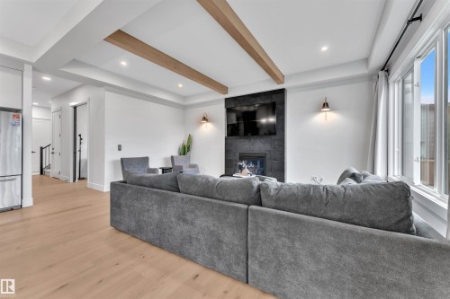 2029 13A Avenue, Edmonton, AB - Indoor Photo Showing Living Room With Fireplace
