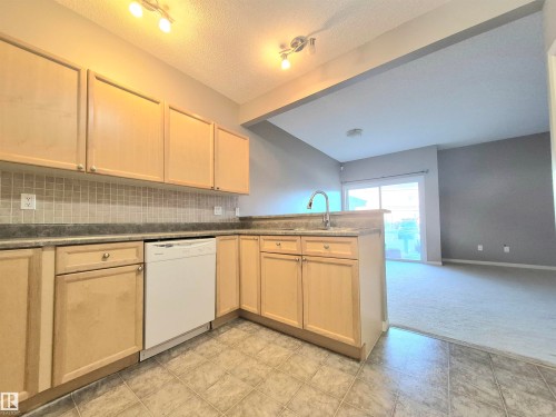 Edmonton, AB - Indoor Photo Showing Kitchen