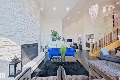 16611 9 St, Edmonton, AB - Indoor Photo Showing Living Room With Fireplace