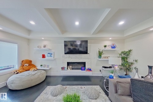 16611 9 St, Edmonton, AB - Indoor Photo Showing Other Room With Fireplace