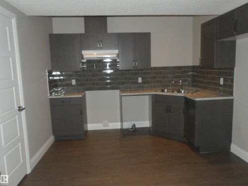 628 Ortona Way Nw, Edmonton, AB - Indoor Photo Showing Kitchen With Double Sink