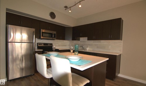 108 10518 113 Street, Edmonton, AB - Indoor Photo Showing Kitchen With Stainless Steel Kitchen